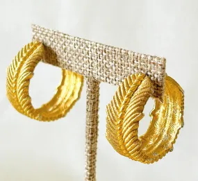 Fantastic 80s signed Givenchy thick statement hoop pierced style earrings.