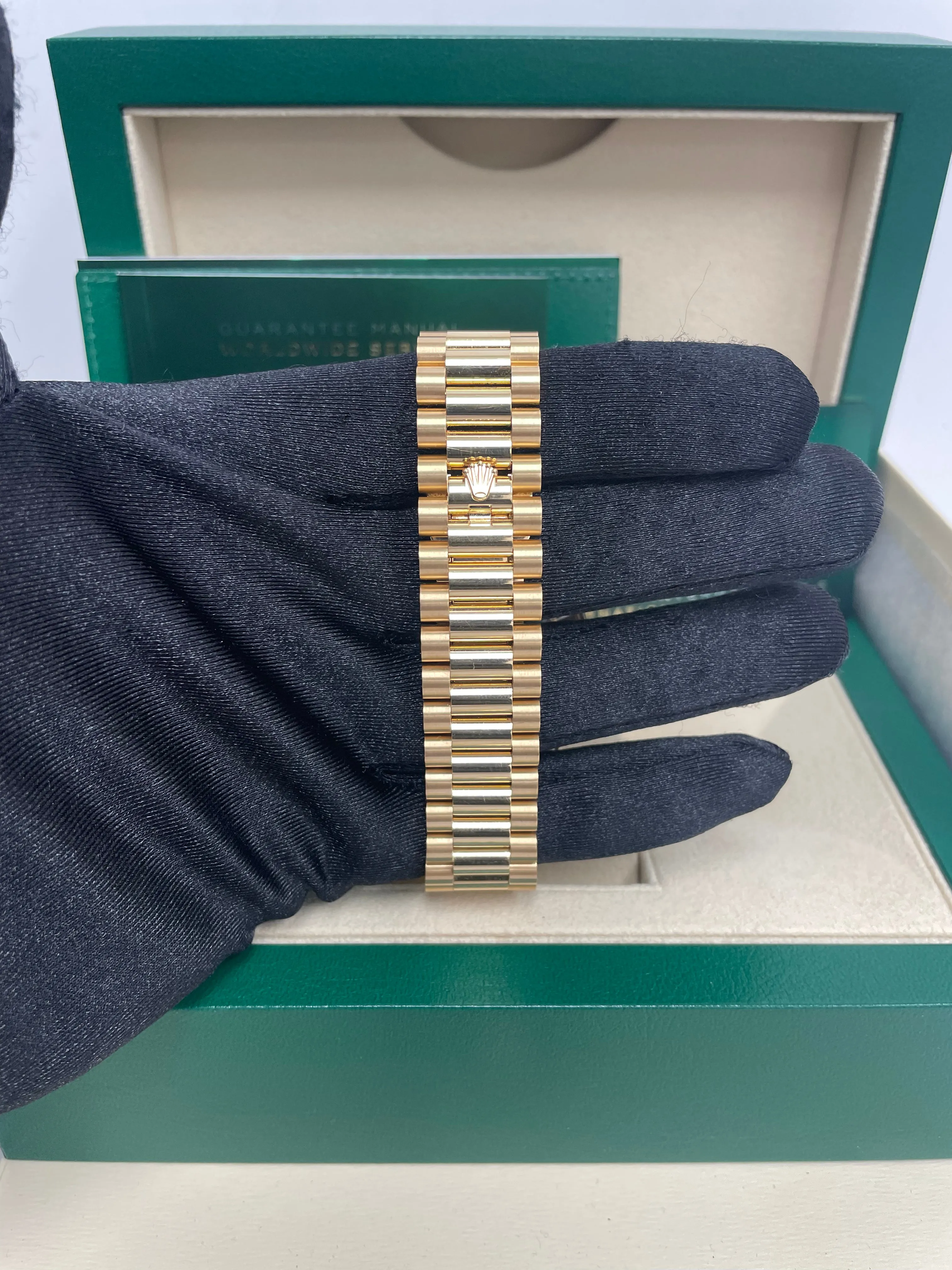 Rolex Yellow Gold Day-Date 40 Watch - Yellow Gold Bezel - Champagne Baguette Diamond Dial - President Bracelet ( Ref# 228348RBR)