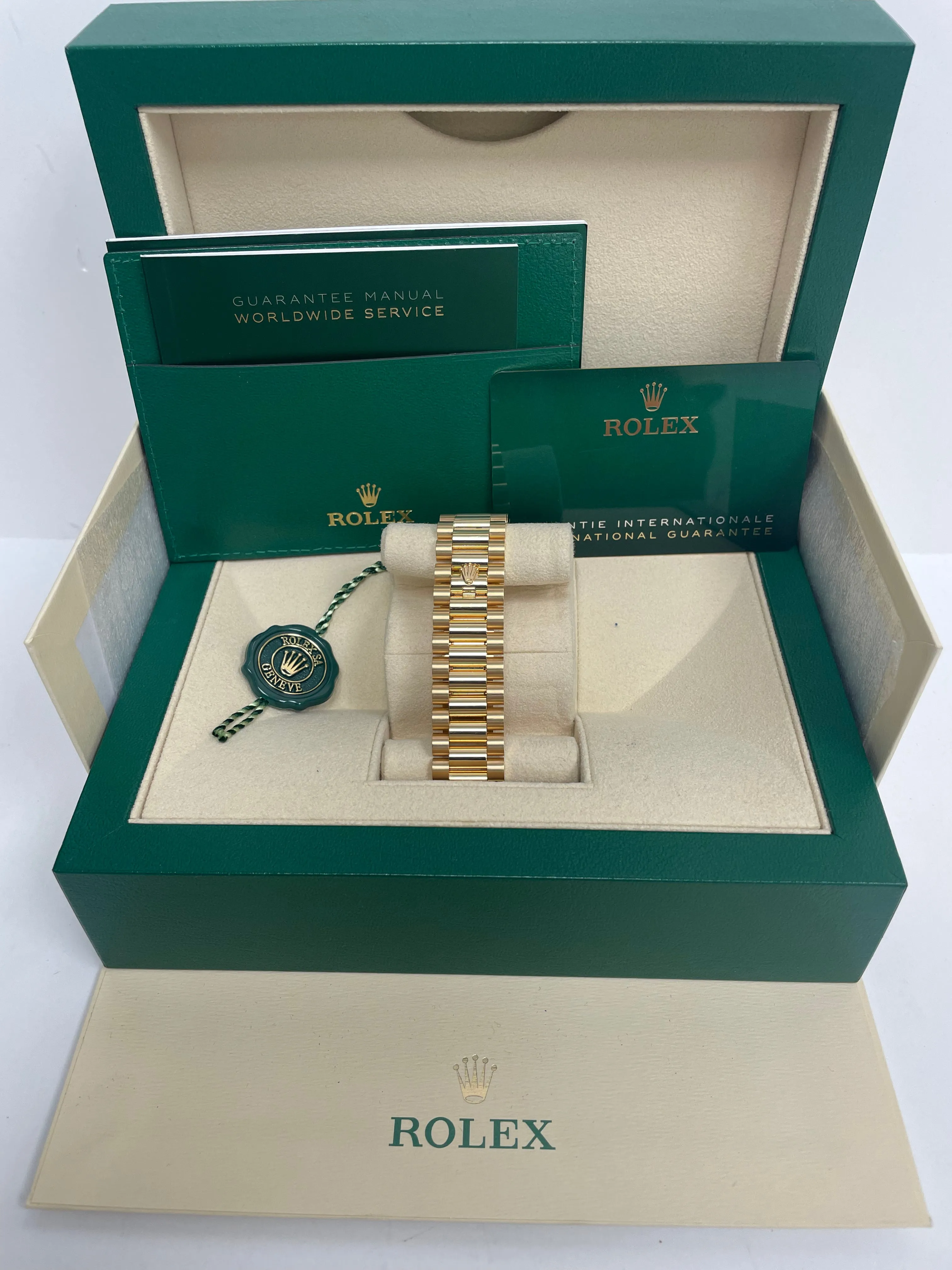 Rolex Yellow Gold Day-Date 40 Watch - Yellow Gold Bezel - Champagne Baguette Diamond Dial - President Bracelet ( Ref# 228348RBR)