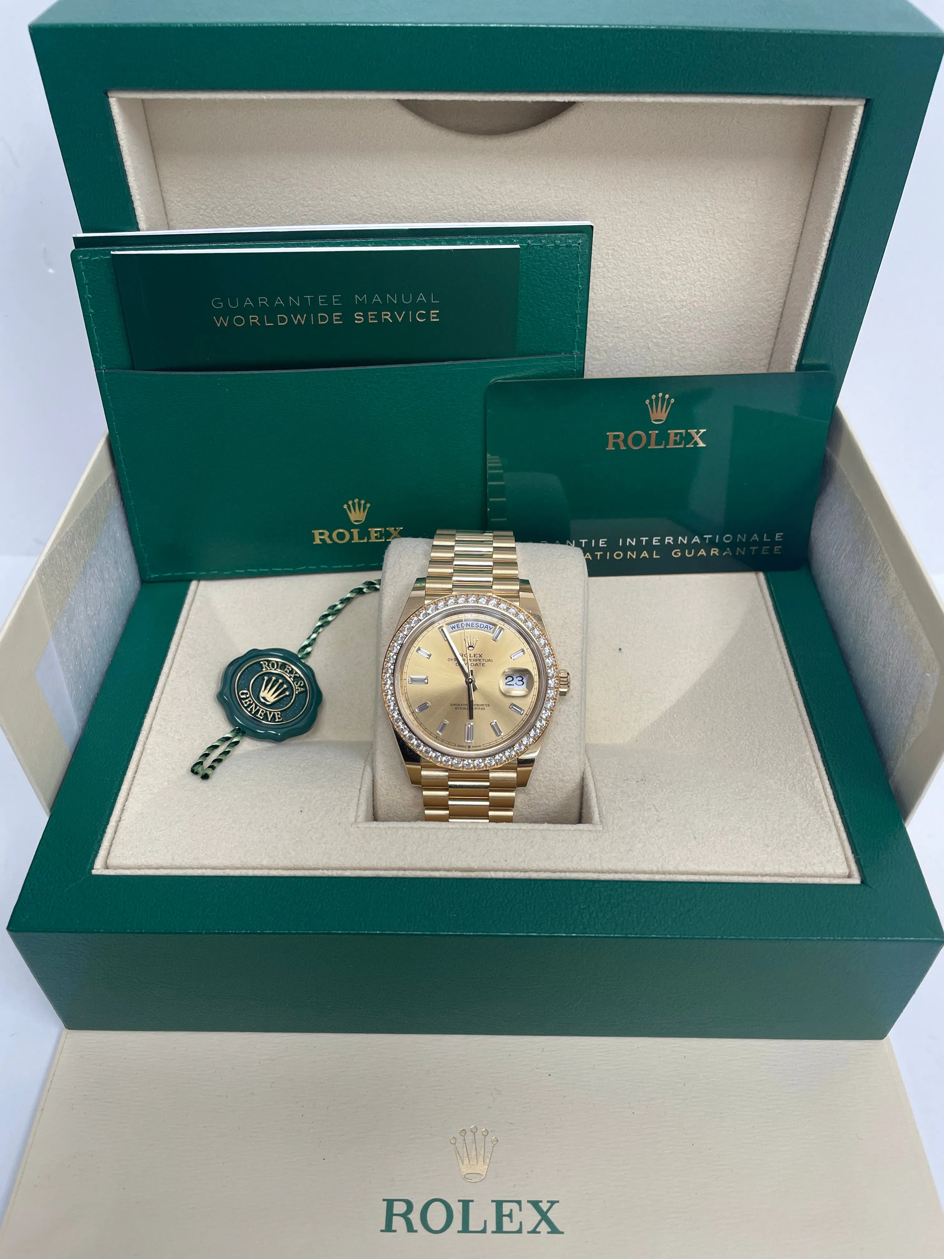 Rolex Yellow Gold Day-Date 40 Watch - Yellow Gold Bezel - Champagne Baguette Diamond Dial - President Bracelet ( Ref# 228348RBR)